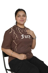 kapda kulture dark brown fury puff print t shirt for women sitting lifestyle view
