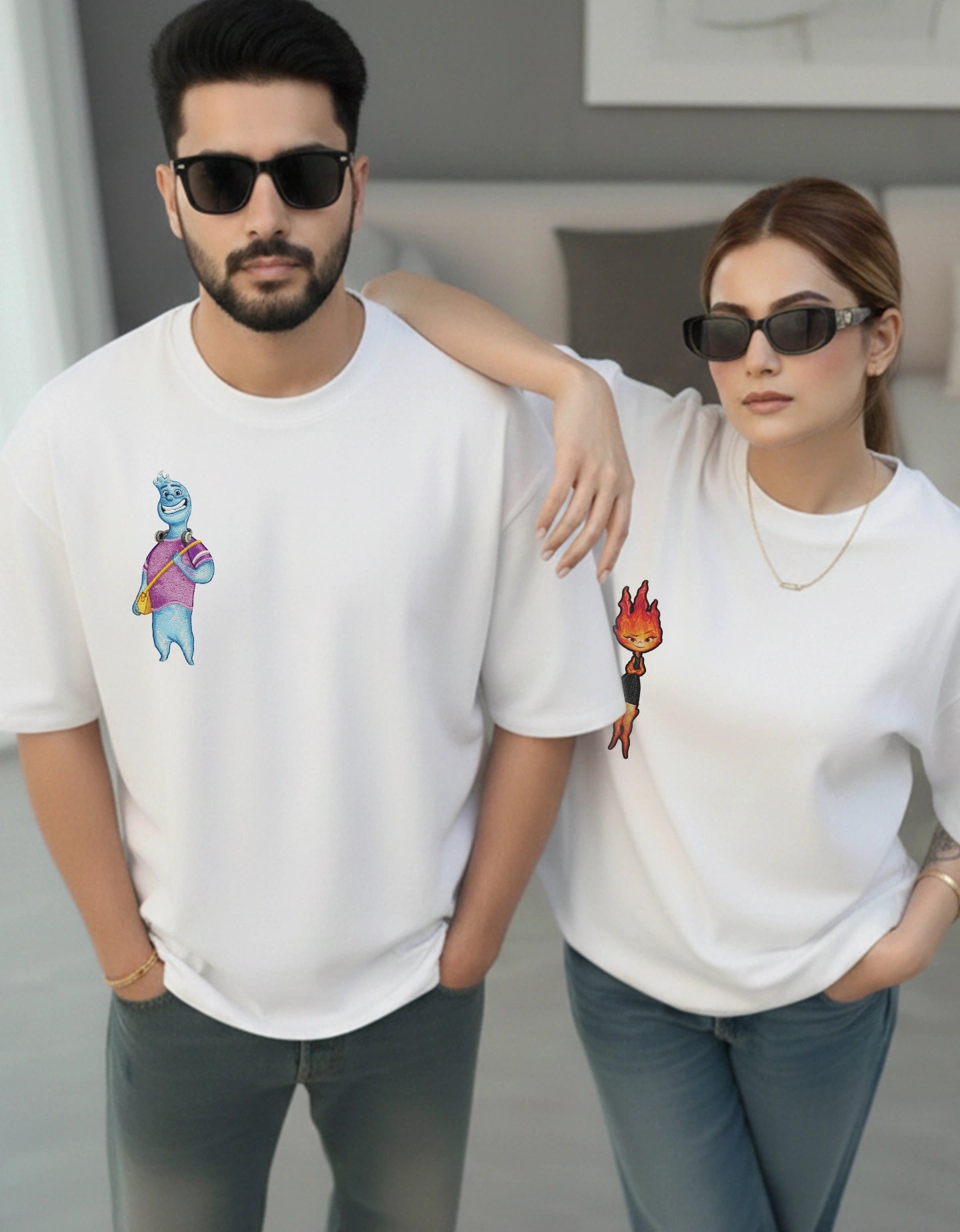 Matching oversized white t-shirts for couples styled with a relaxed streetwear vibe