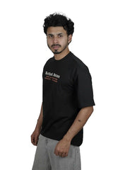 Kapda Kulture black puff print oversized t shirt casual streetwear front view model pose