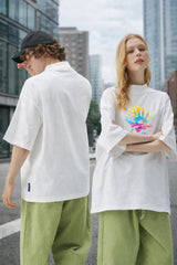 Couple wearing white oversized matching t shirts Kapda Kulture aesthetic streetwear India casual summer look