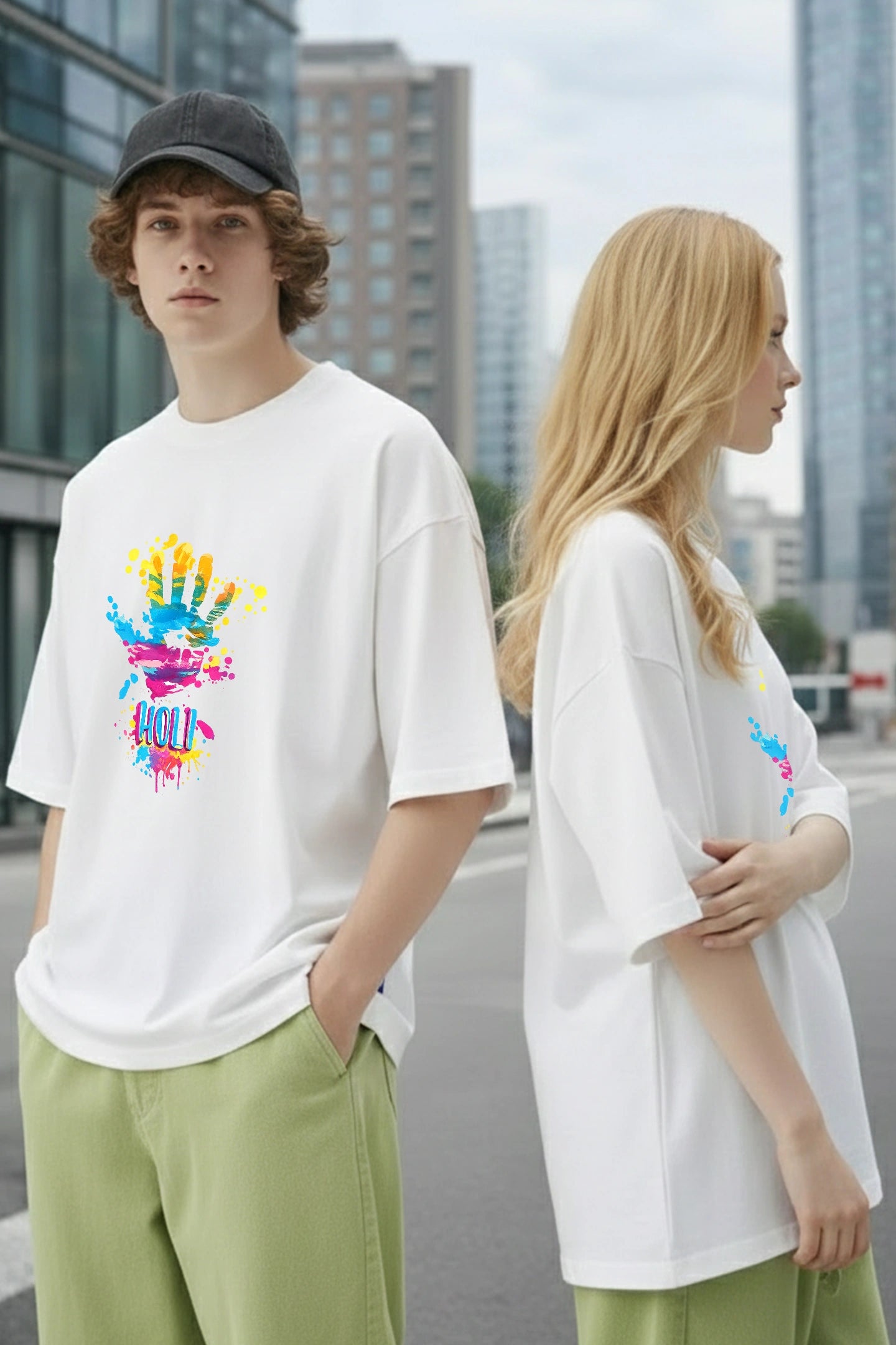 White oversized t shirt for couples with colorful Holi graphic Kapda Kulture streetwear India close front design