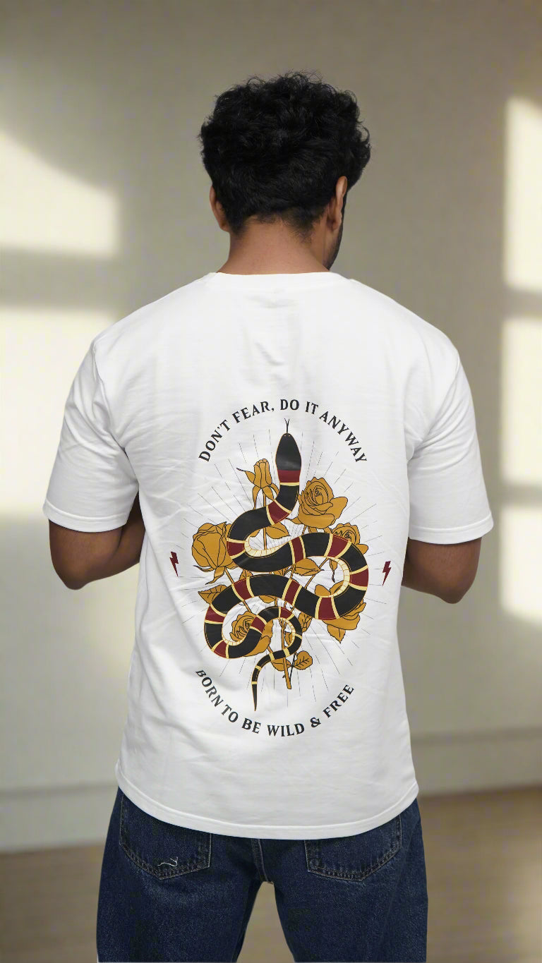 Person wearing a white sweatshirt with a colorful design and text on a gray background