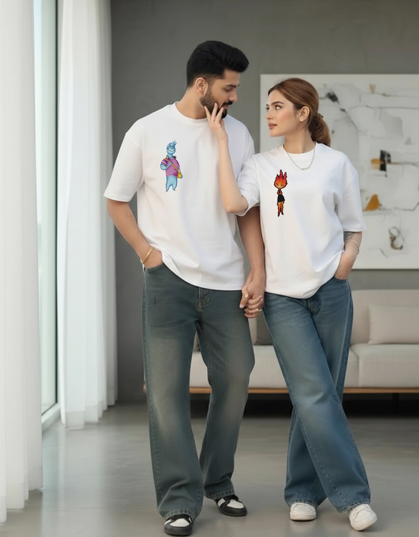 Young couple wearing matching white oversized t-shirts in a lifestyle setting
